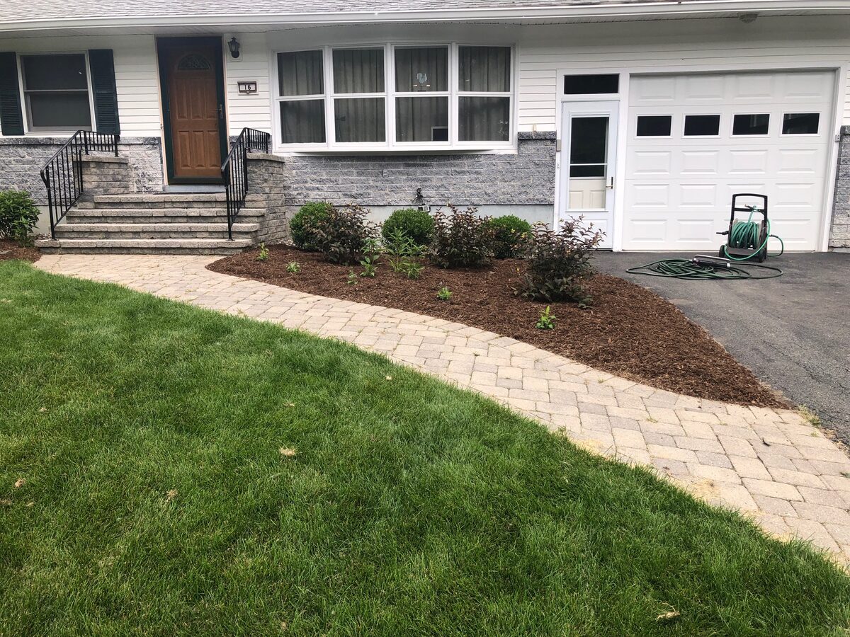 Completed landscape bed with new plantings